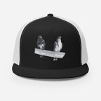 Black and white Gen122 CopyThat Trucker Hat with Samson and Sally pigeon pair artwork