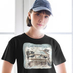 Front view of black Crop Tee by Gen122 featuring Coo and the Gang pigeon flock artwork